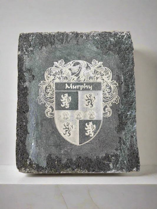 Hand-engraved limestone house sign with Celtic design family crest