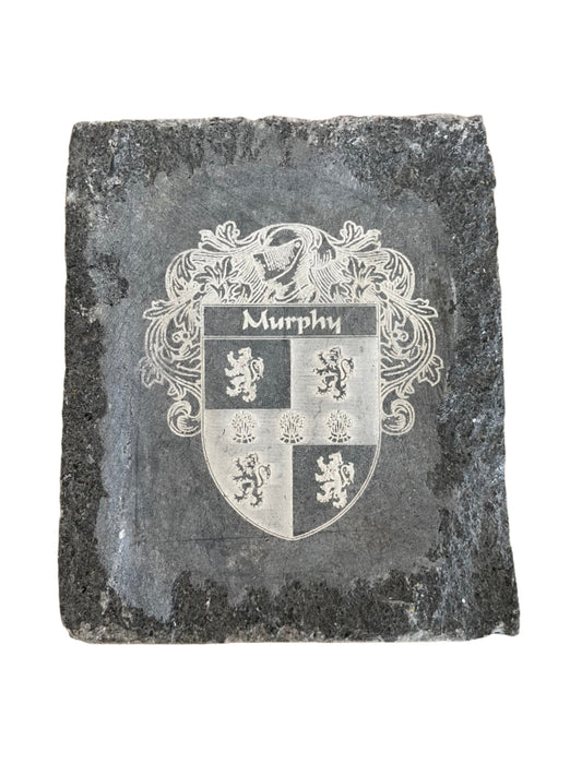 Hand-engraved limestone house sign with Celtic design family crest